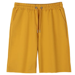 Mens summer casual sports shorts in lightweight fabric with an elastic waistband and side pockets, designed for active wear.
