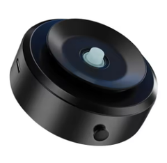 Magnetic double-sided mobile phone holder car mount attached to dashboard, holding a smartphone securely for hands-free use.