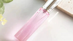 Elegant bottle of My Store pheromone perfume for women, showcasing the sleek design and luxurious packaging.