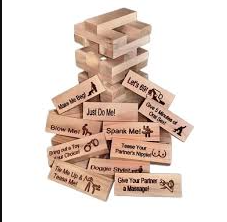 LoveStack Couples Game by My Store showing colorful game cards and stacking pieces on a wooden table.