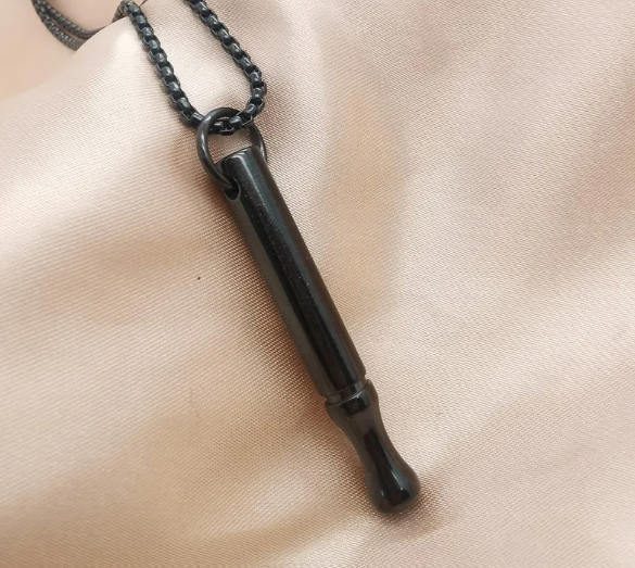 Breathing necklace for anxiety relief with a sleek silver chain and pendant designed to promote calming breathing exercises.