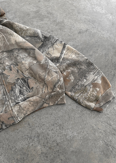 Urban camo retro hoodie with a bold camouflage pattern and relaxed fit, featuring a drawstring hood and ribbed cuffs.