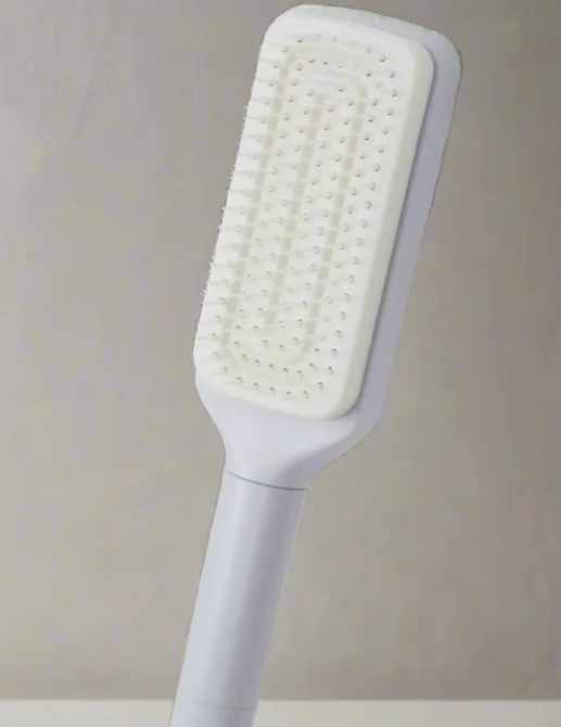 4-in-1 self-cleaning brush from My Store with durable bristles and ergonomic handle, designed for versatile cleaning tasks