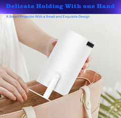Portable projector from My Store with sleek design, showing projection screen and control buttons on a modern surface.